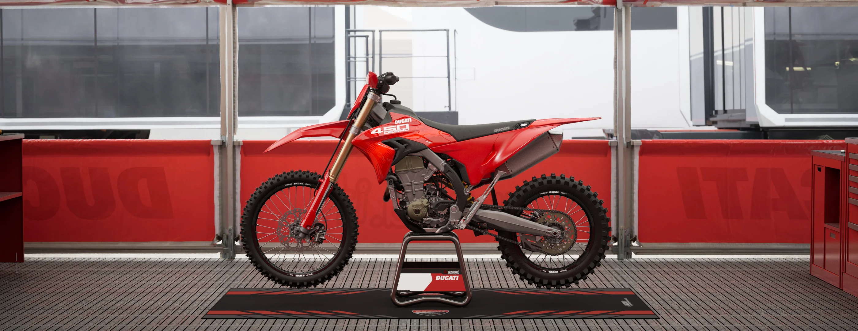 2026 Ducati Desmo450 EDX red motorcycle left-side profile
