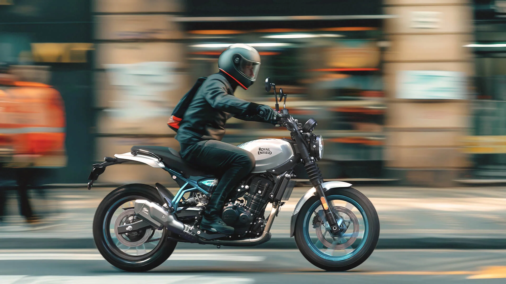 2026 Royal Enfield Guerrilla 450 parked in a city lifestyle setting, exterior side profile.